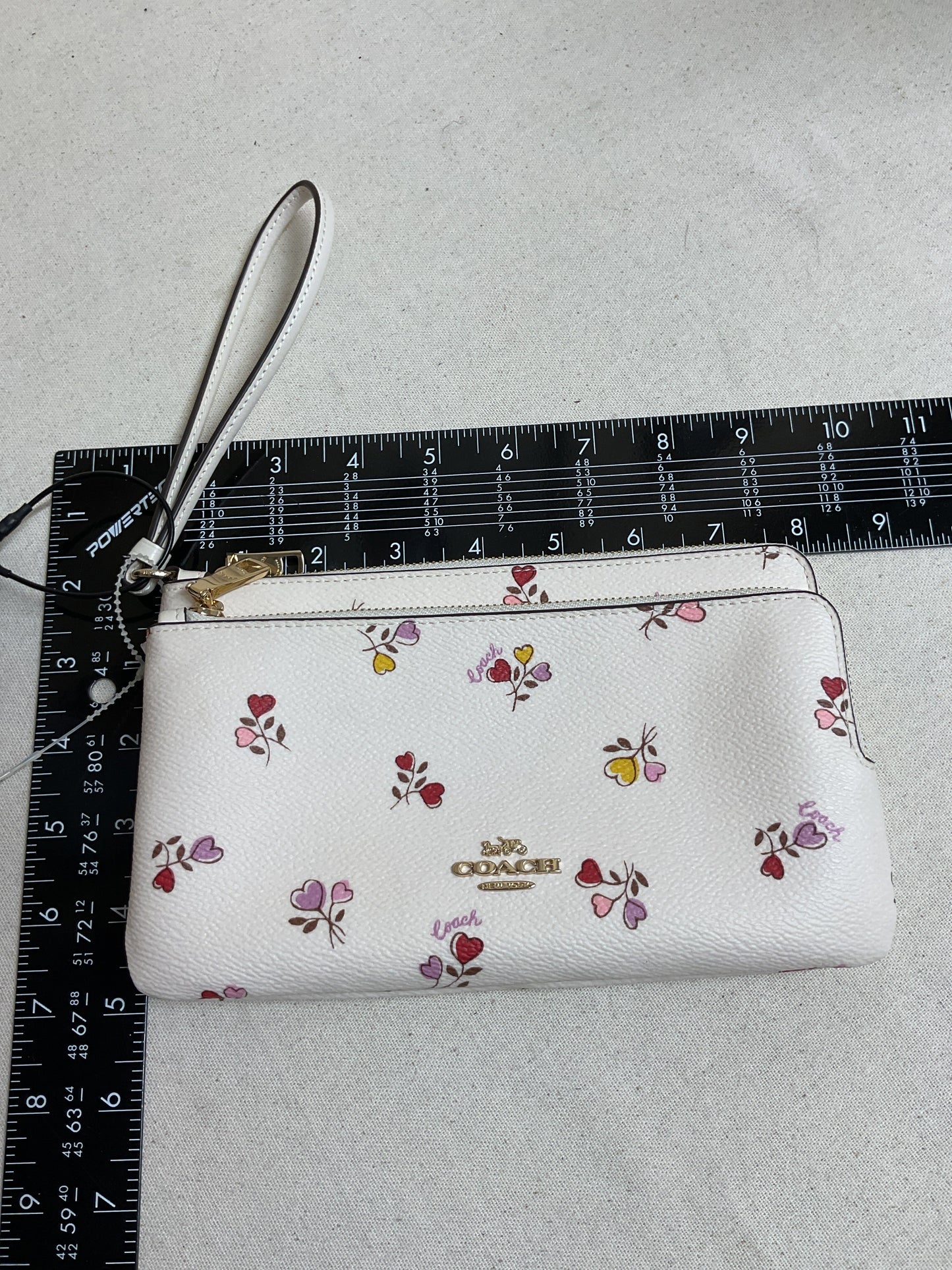Wristlet Designer By Coach In Floral Print, Size:Large