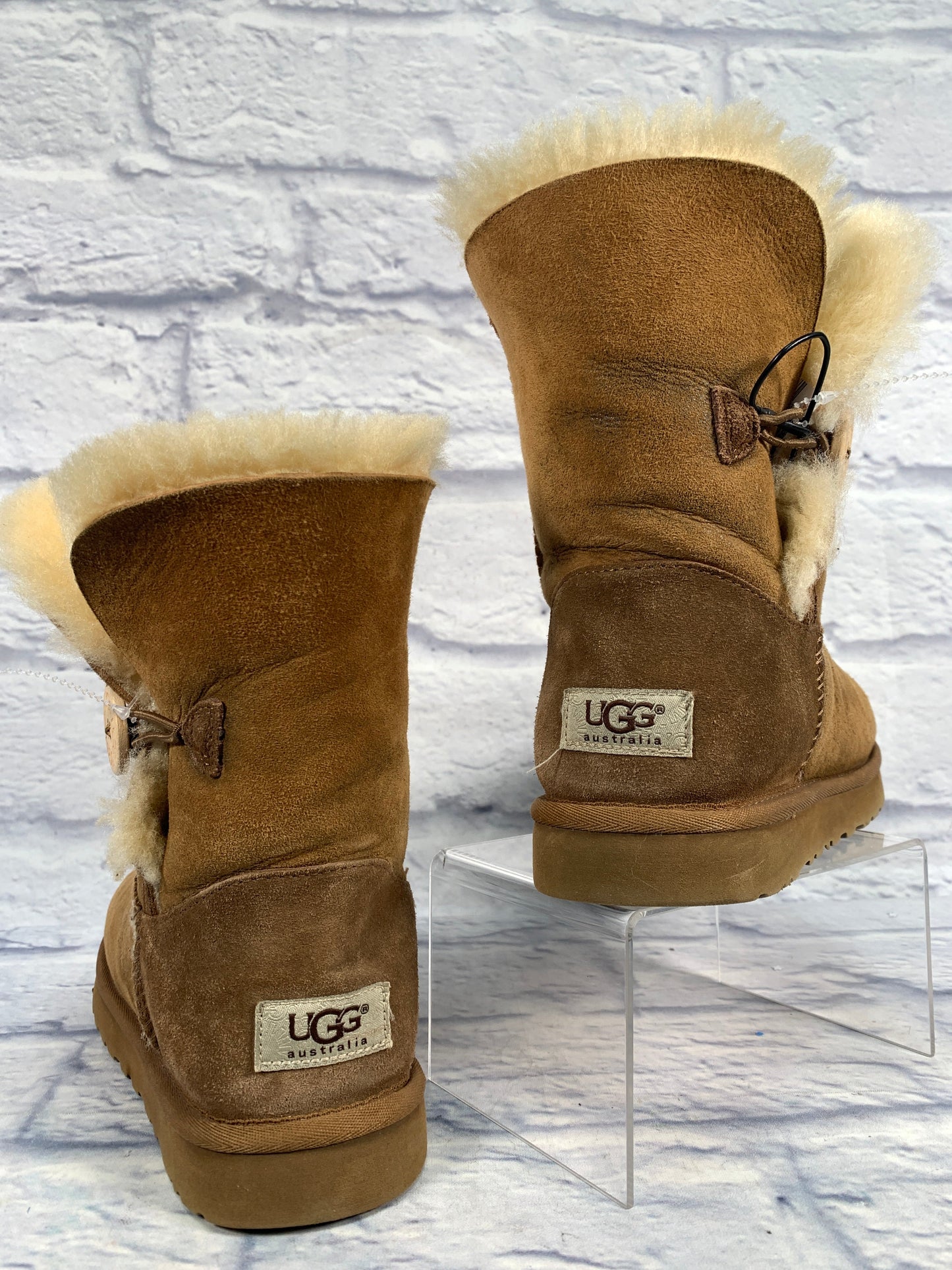 Boots Designer By Ugg In Brown, Size: 7