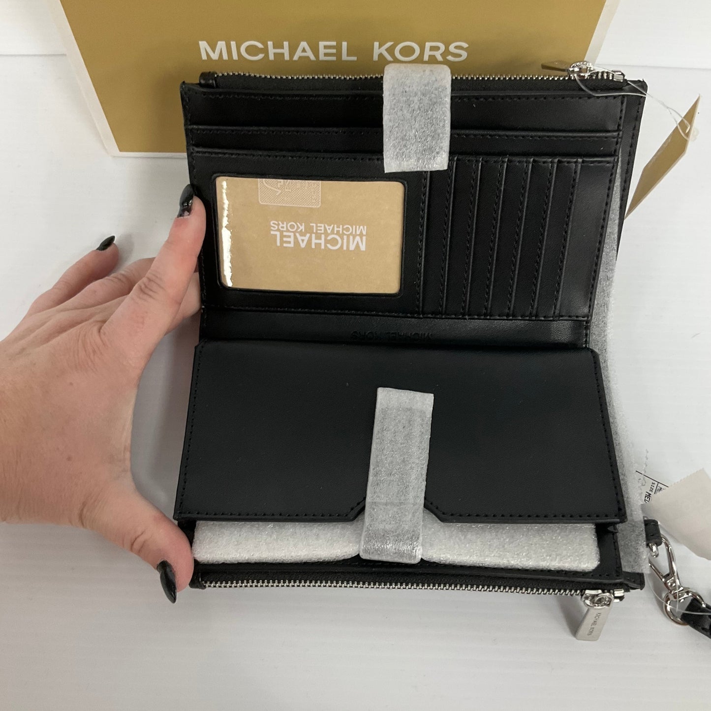 Wristlet Designer By Michael Kors, Size: Medium