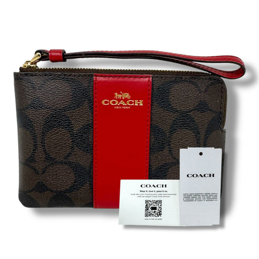 Wristlet Designer By Coach, Size: Medium