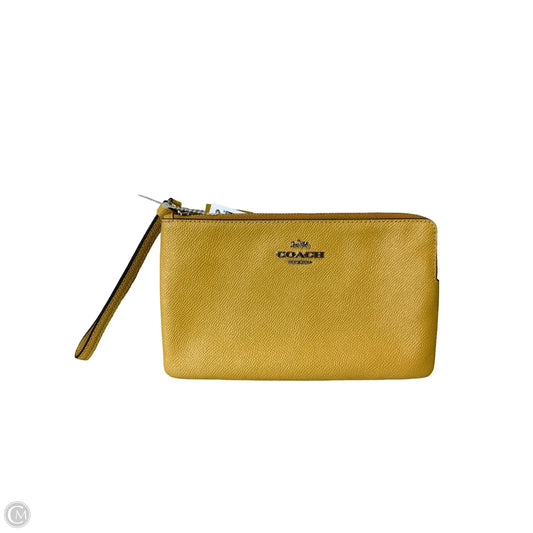 Wristlet Designer By Coach, Size: Medium