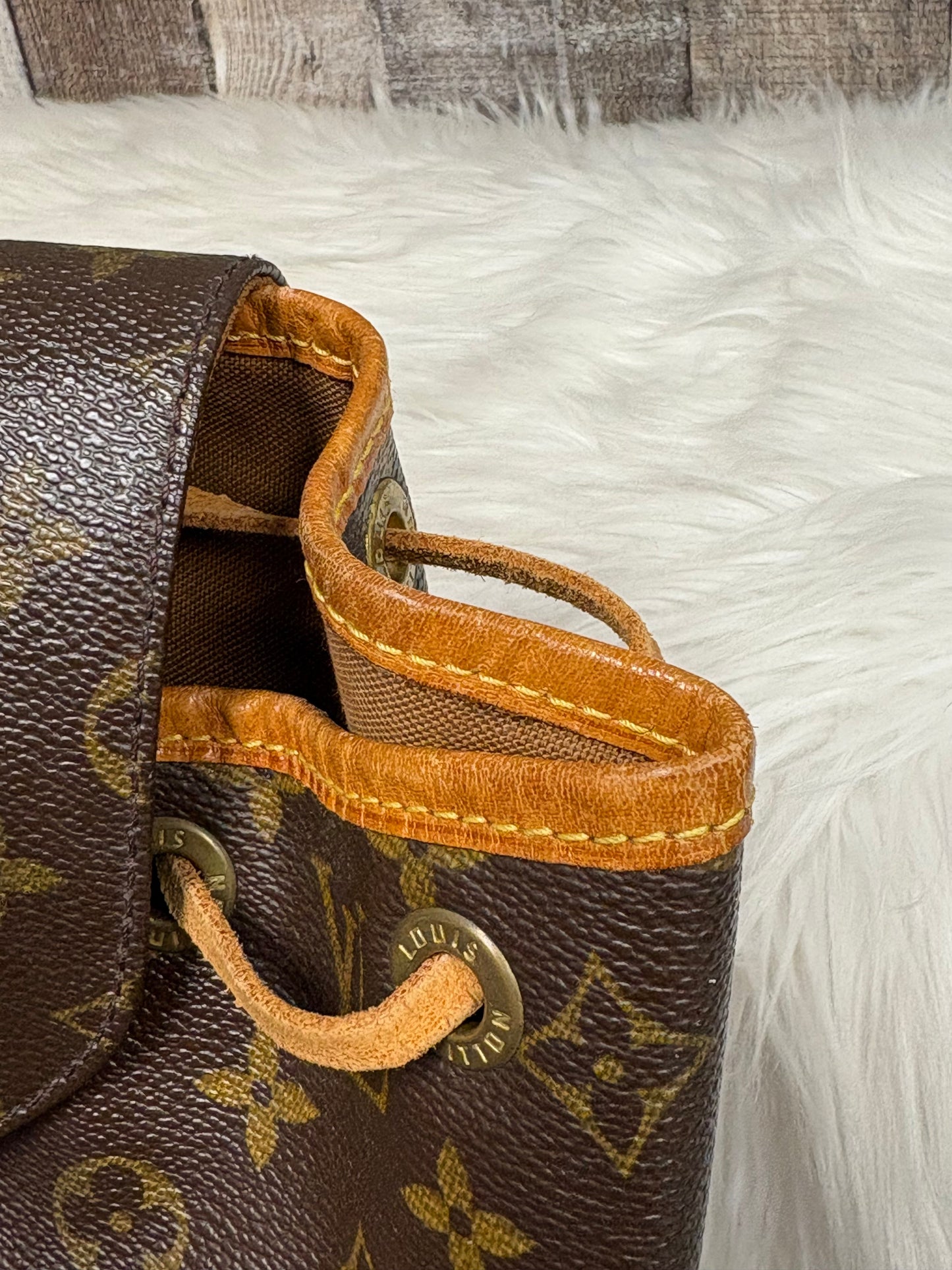 Backpack Luxury Designer By Louis Vuitton, Size: Medium